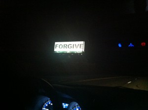 Said "FORGIVE" sign.   It's near Clovis.